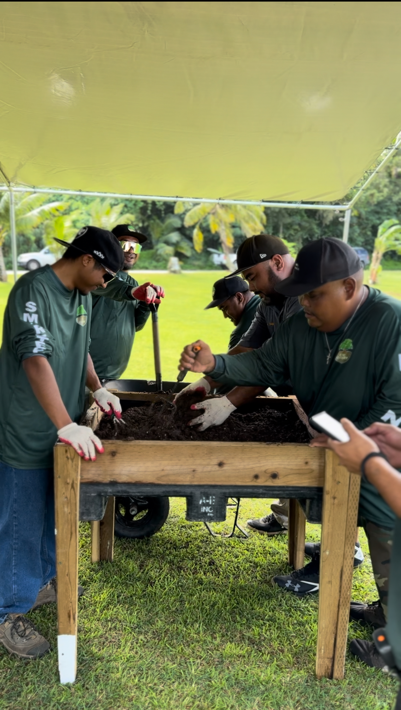 team preparing soil