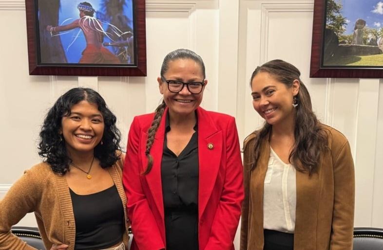 Two CRI staff with the CNMI congressional representative